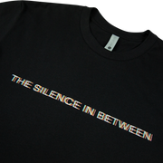 THE SILENCE IN BETWEEN TEE